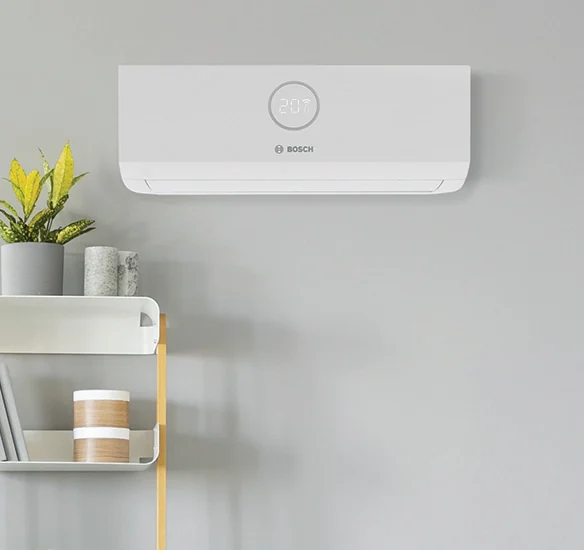 Wall-mounted split air conditioner in a modern living room